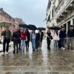 students in the rain